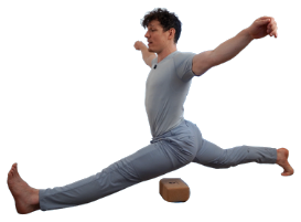 Active front split lift, hovering above a yoga block